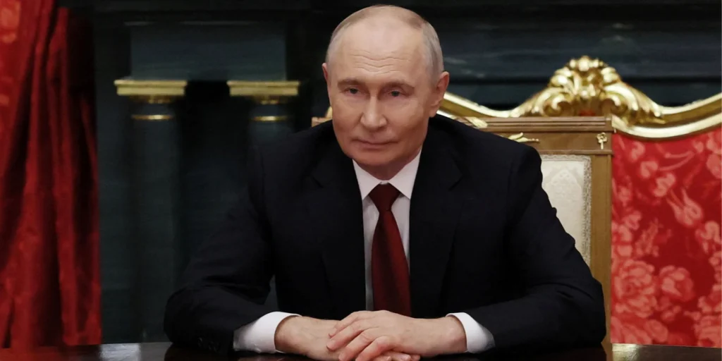 Володимир Путін на зустрічі з американськими представниками в Кремлі.